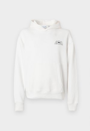 Hanorac alb cu buzunar frontal, glugă cu șnur, manșete și tiv rib, având un logo Lacoste negru brodat pe partea stângă a pieptului.