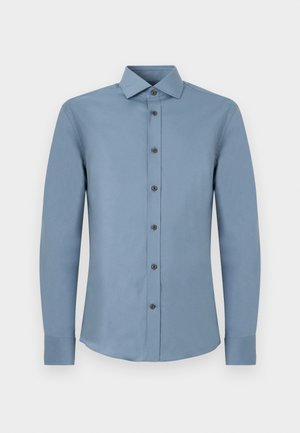 Men’s long-sleeve button-up shirt in solid muted blue with pointed collar and buttoned cuffs, shown flat on white background.