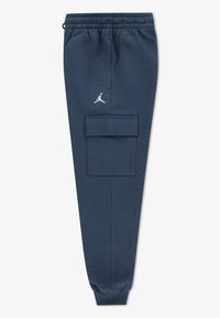 Σκούρο μπλε παντελόνι jogging κατασκευασμένο από μαλακό ύφασμα, με ελαστική μέση, σκουλαρίκια στους αστραγάλους και μεγάλη τσέπη με καπάκι στο πλάι. Λευκή λεπτομέρεια με λογότυπο.