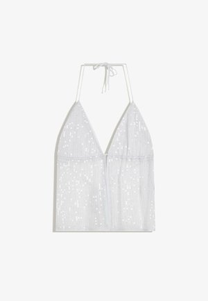 Weißes ärmelloses Oberteil mit Halterdesign, aus einem transparenten Stoff mit verstreuten Pailletten für Textur und Glanz.