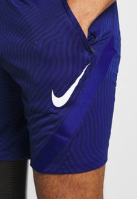 Nike Performance Urheilushortsit - blue