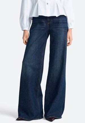 Alt laienevad teksad - denim blue