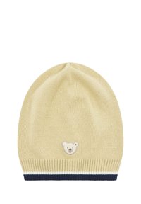Gebreide beanie in lichtgeel met een beerpatch op de voorkant. Heeft een marineblauwe en witte gestreepte ribboord. Zachte textuur, ronde vorm.