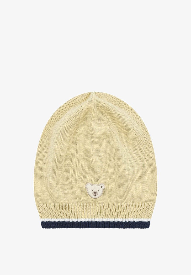 Gebreide beanie in lichtgeel met een beerpatch op de voorkant. Heeft een marineblauwe en witte gestreepte ribboord. Zachte textuur, ronde vorm.