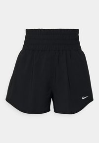 Short de sport noir avec une large ceinture élastique haute et un petit logo blanc Nike sur la partie inférieure de la jambe droite.