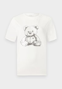 T-shirt en coton blanc avec un motif d'ours imprimé en gris, agrémenté de sequins, à manches courtes et col rond. Coupe régulière.