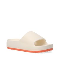 Slide sandal in cream with an open toe and a textured orange outsole. Made of smooth material, featuring a contoured shape.