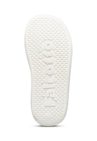 Semelle en caoutchouc blanche présentant un motif de grille texturé avec un logo "Falcotto" en relief au centre, conçu pour l'adhérence et la durabilité.