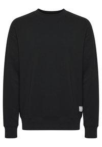 Black sweatshirt made of soft cotton, featuring a crew neck, long sleeves, ribbed cuffs, and a small label detail on the bottom left.