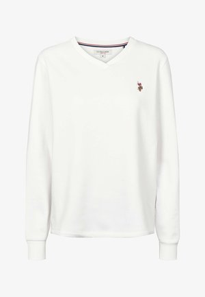 Hvit langermet V-hals skjorte laget av myk bomull. Har en liten logo på brystet, ribbekanter på ermene og en klassisk passform.