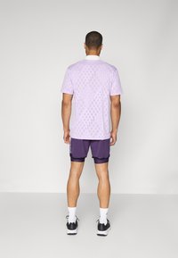adidas Performance SHORT 2-IN-1 - Tights - aurora plum