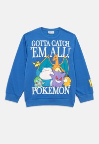 Μπλε φούτερ με καρτούν γραφικά Pokémon και λευκό κείμενο που λέει "Πρέπει να τα πιάσεις όλα! Pokémon", με ριμπ μανσέτες και στρογγυλή λαιμόκοψη.