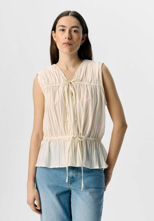 ÄRMELLOSES - Blouse - sandshell