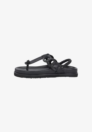Sort flip-flop sandal med gummisål, der har et cirkulært accentdesign, tekstureret rem og elastisk bagbånd for en sikker pasform.