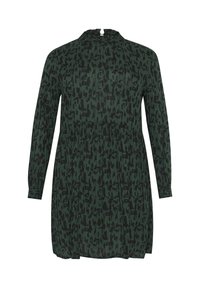 Robe verte avec un motif abstrait noir, manches longues, col haut et un design ample avec un effet froncé à la taille.