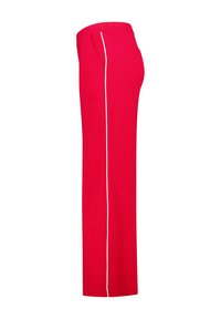 Red stretch pants with a wide waistband, featuring white side piping and two side pockets for functionality. Smooth texture, straight fit.