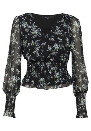 Blouse noire transparente à manches longues avec petit imprimé floral blanc et bleu, taille et poignets froncés, et encolure en V.