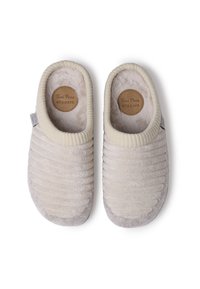 Pantofole beige con texture a coste e rivestimento morbido. Forma arrotondata, suola imbottita e soletta con logo circolare. Accentuate con una suola a contrasto.