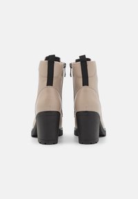 Marco Tozzi Bottines à talons hauts - ivory