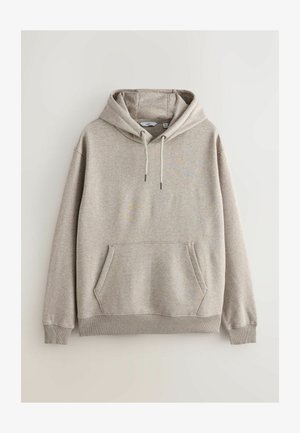 Beige kapuutsiga dressipluus, mis on valmistatud pehmest kangast, millel on eesmine tasku, reguleeritava tõmbluku kapuuts ja soonikservad mansettide ja allosa juures.