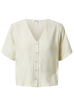 Crème-kleurige blouse met korte mouwen, een V-hals en knopen aan de voorkant. Zachte, gestructureerde stof met een ontspannen, boxy vorm.
