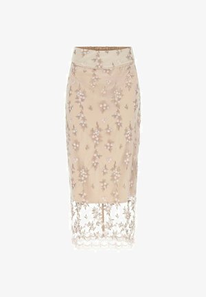 Beżowa spódnica midi z wysokim stanem, kwiatowym haftem oraz przezroczystym koronkowym dołem sięgającym poniżej podszewki.
