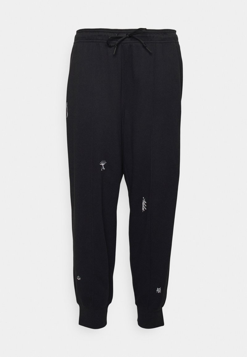 adidas Sportswear Tracksuit bottoms black/white/black Zalando.de