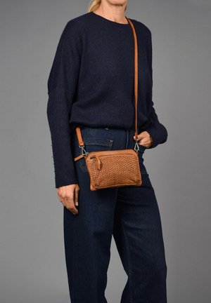 KNITTED MINI - Cross body bag - Brown leather