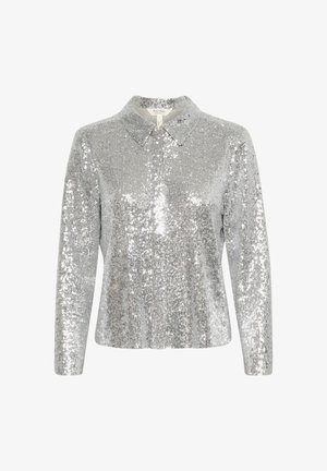 Ezüst flitteres felső hosszú ujjal és gallérral. Simaság jellemzi finom fényes felületével. Egyenes szabású dizájn, látható záródás nélkül.