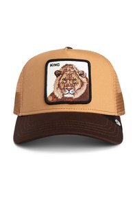 Gorra trucker marrón y beige con un parche bordado de la cara de un león etiquetado como "REY". La visera es de color marrón oscuro y presenta lados de malla para mayor transpirabilidad.