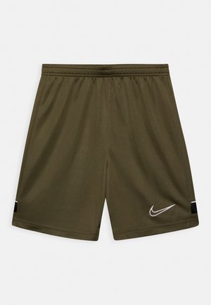Oliwkowe spodenki sportowe z elastycznym pasem, czarnymi akcentami po bokach i białym logo Nike na dolnej prawej nodze.