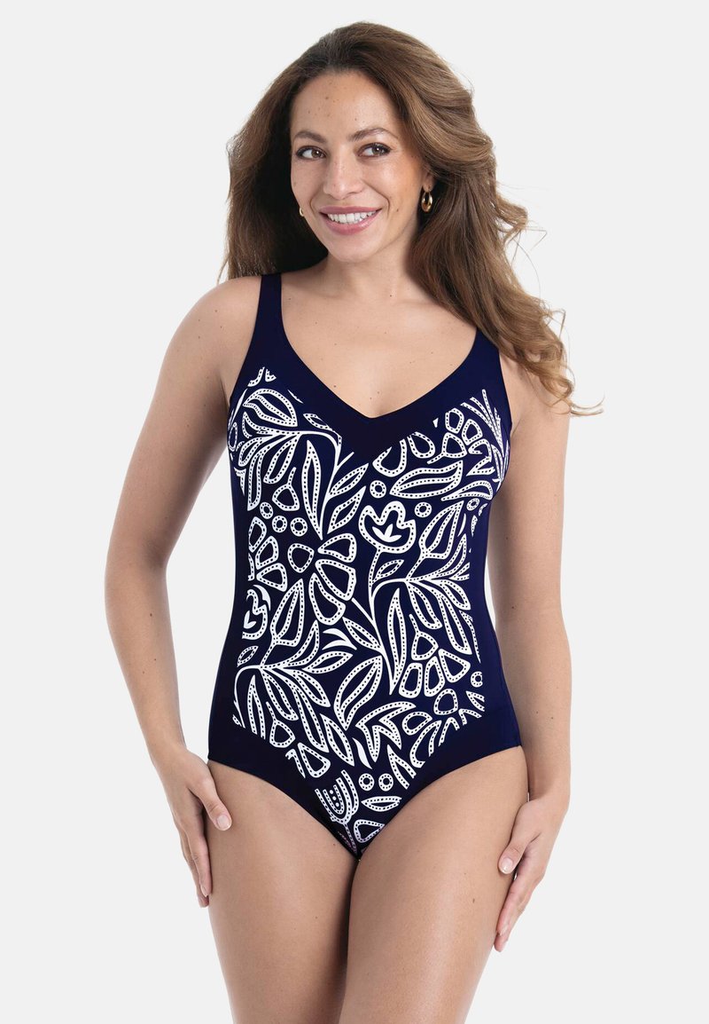 Marineblauer Einteiler mit weißem Blumenmuster. Verfügt über einen V-Ausschnitt und breite Träger, gefertigt aus glattem, elastischem Stoff.