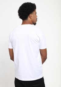 Disney MICKEY CLASSIC VINTAGE CLASSIC UNISEX - T-shirt med print - white