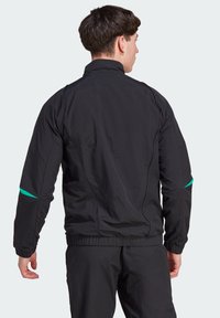 adidas Performance MANCHESTER UNITED TIRO 23 PRESENTATION TRACK - Equipación de clubes - schwarz