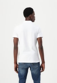 Hollister Co. Stretch Polo 3-Pack - Poloshirt - white/navy/black