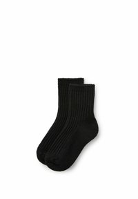 Calze di cotone nere a coste con design a metà polpaccio. Presentano una superficie testurizzata e una punta rinforzata. Adatte per un uso quotidiano.