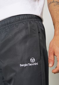 Sergio Tacchini CARSON - Calças de fato de treino - ebony/white
