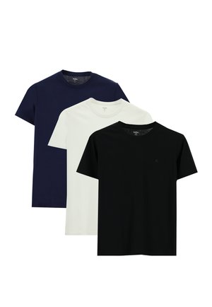 Three short-sleeve t-shirts in navy, white, and black, made of soft cotton, featuring a crew neckline and no visible patterns or accents.