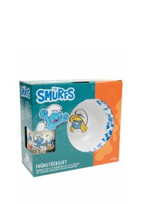 Set colazione con una ciotola bianca con accenti blu e personaggi dei cartoni animati. Include una tazza coordinata con design colorati. Confezione in scatola.