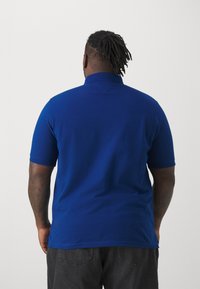 Tommy Hilfiger 1985 REGULAR - Poloshirts - anchor blue