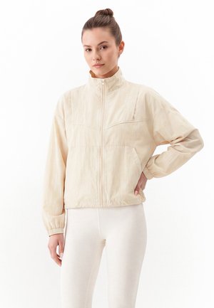 myMo ATHLSR, Lichte jas - cream