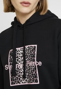 NA-KD Jersey con capucha - black