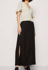 Morgan Neule - gold-coloured