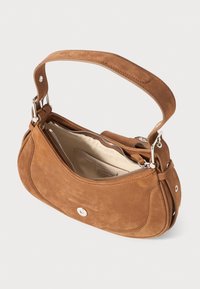 Brown suede handbag with an adjustable handle, zip closure, and metallic hardware. Features a textured surface and a spacious interior.