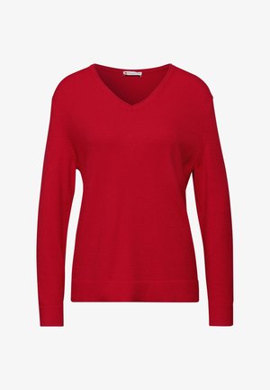 Punainen, pitkähihainen neule, jossa on V-pään design. Valmistettu tekstuuri neulekankaasta, jossa on ribbikuvioidut hihat ja helma. Yksinkertainen, tasainen väri.