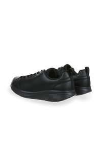 Black athletic shoes with a smooth leather upper, round toe, lace-up design, pull tabs, and textured rubber sole for grip and comfort.