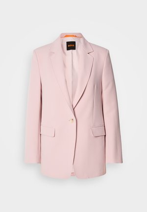 Pink tailored blazer with notched lapels, single button closure, two front pockets, and a smooth texture. Brand tag visible inside collar.