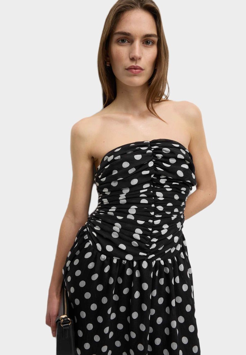 Jupe midi pois - Femme | MANGO Nouvelle-Calédonie