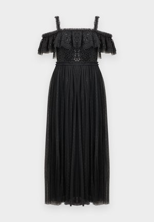 Must mustriga musta kleit avatud õlgadega, millel on kihiline volangkaelus, istuv põhi sädelustega ning voolav läbipaistev seelik täppidega.