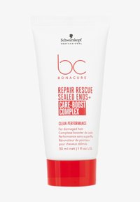 Vit tub med röd botten, med svart och röd text som lyder "bc Bonacure Repair Rescue Sealed Ends+." 30 ml.